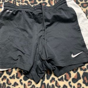 Black and white shorty shorts.
